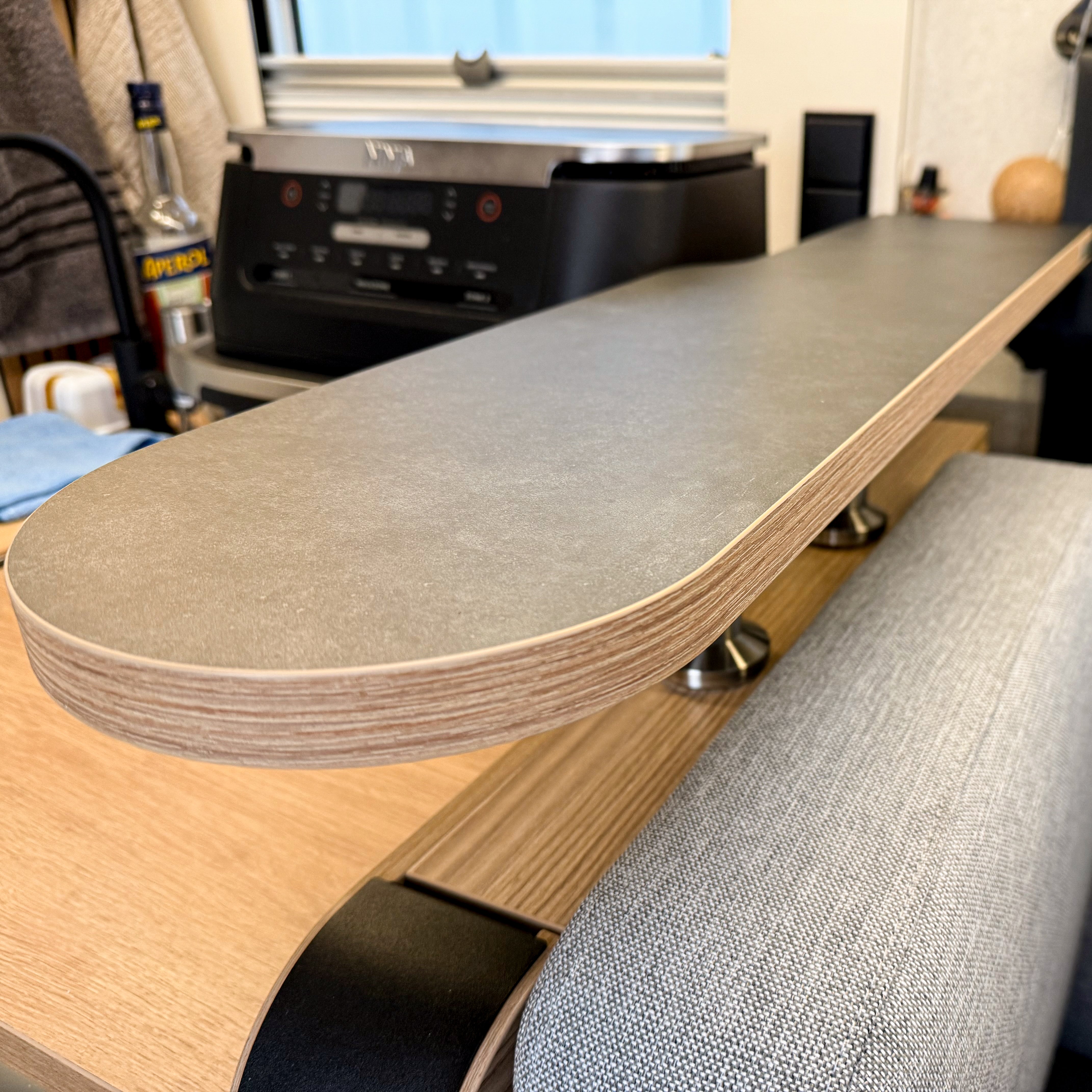 Tray for Mooveo (available starting in 2026) with a cutout for the stove cover