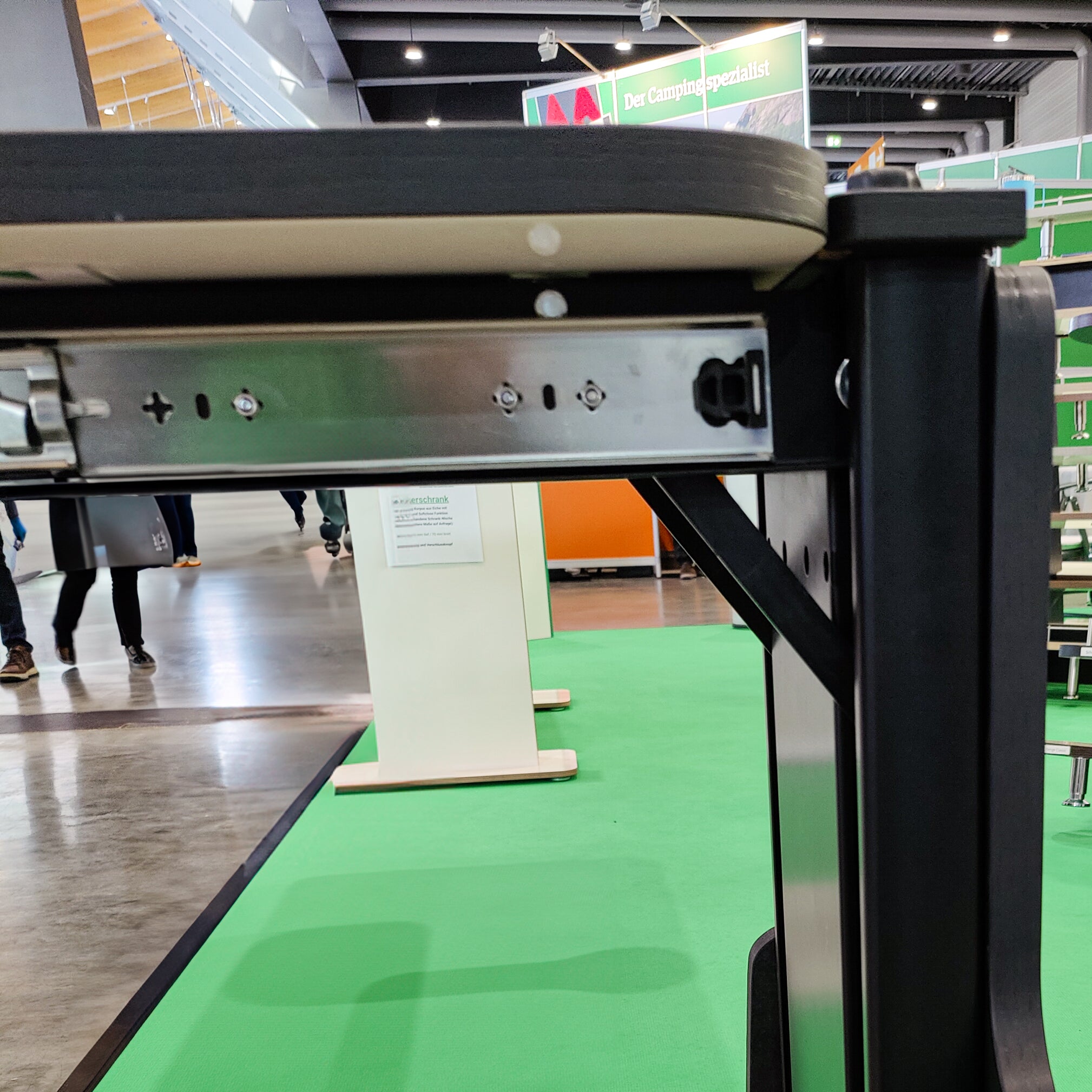 Floating table for panel vans and campervans